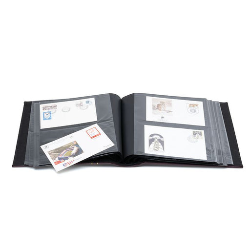 Öppet Leuchtturm FDC-album som visar transparenta fickor för vykort i C6-format